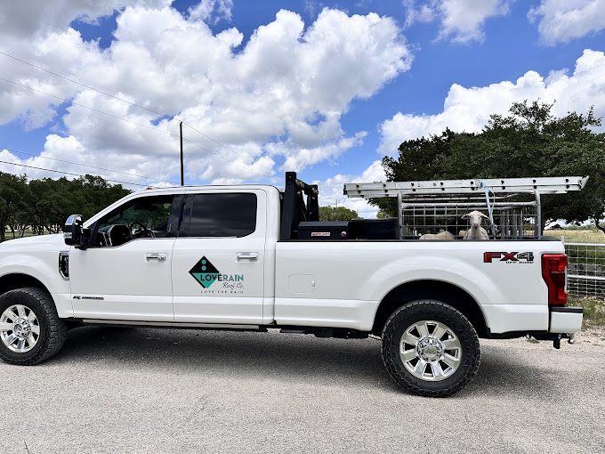 The branded F-250 loaded with ladder racks