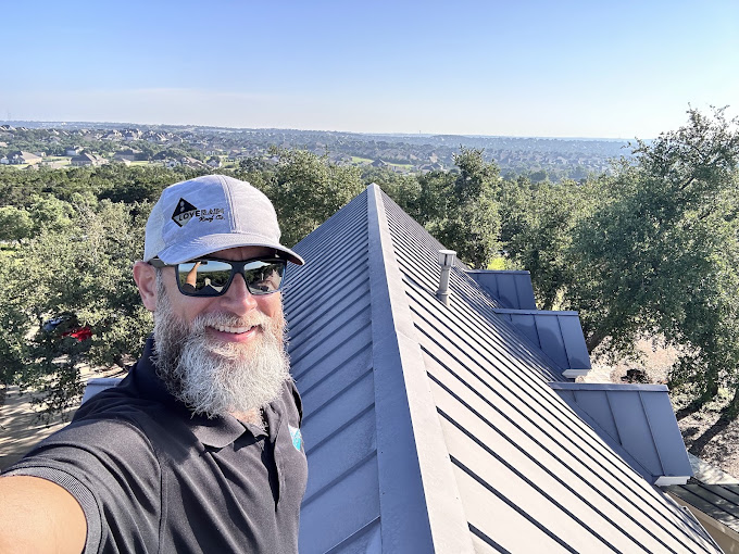 Jake on a finished standing seam roof